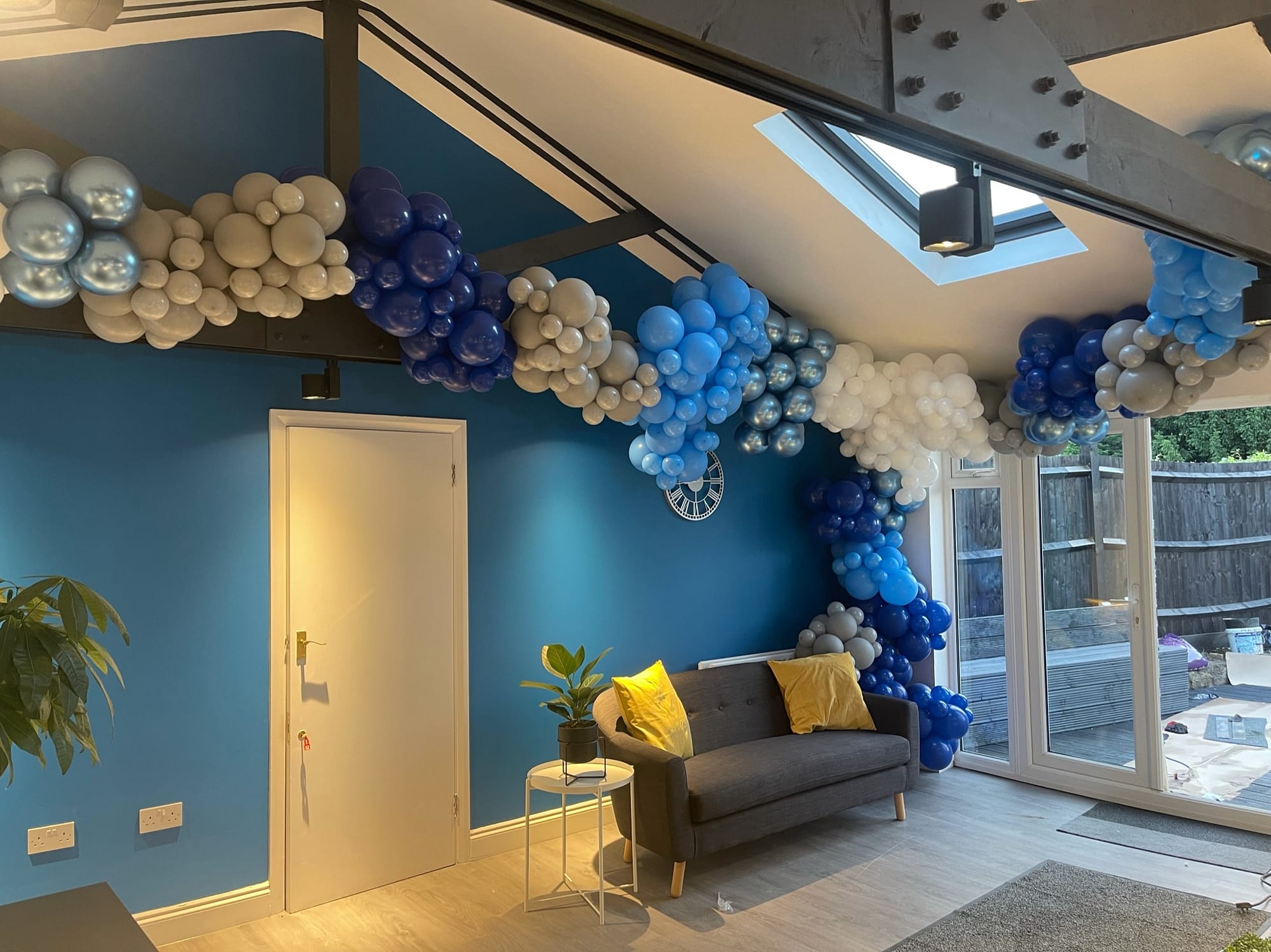 Blue, white and purple balloons