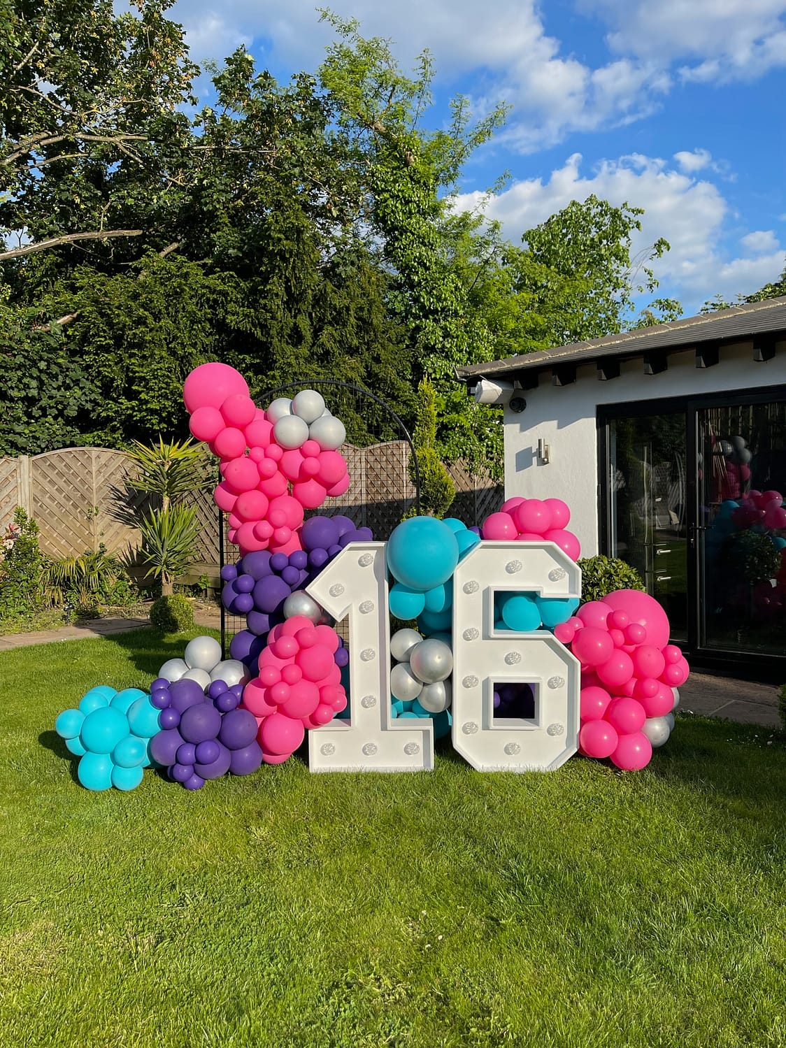 16 light up numbers with balloons