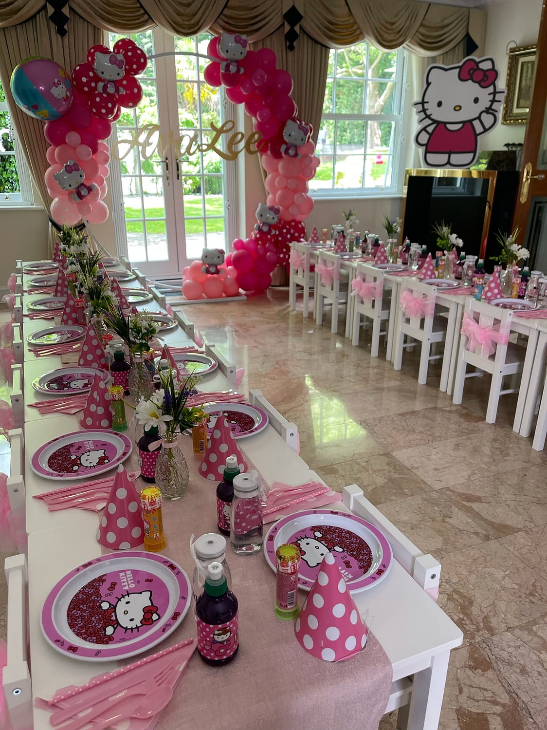 Hello Kitty themed birthday balloons and catering