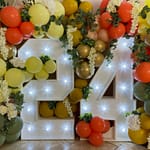 24 light up numbers with balloons and flowers