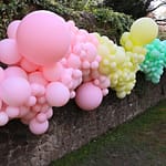 Balloons on stone wall