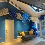 Blue, white and purple balloons
